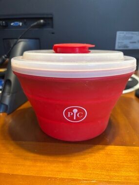 Pampered Chef Red Silicone Collapsible Food Bowl with White Lid and Red Vent